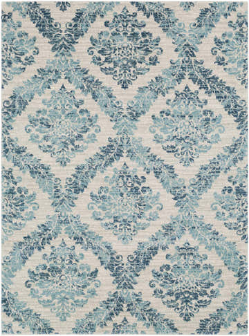 Close-up of the Oaklyn Teal Floral Diamonds Rug. Ivory rug with a teal and navy blue floral diamond pattern. Design-Rectangle-5373