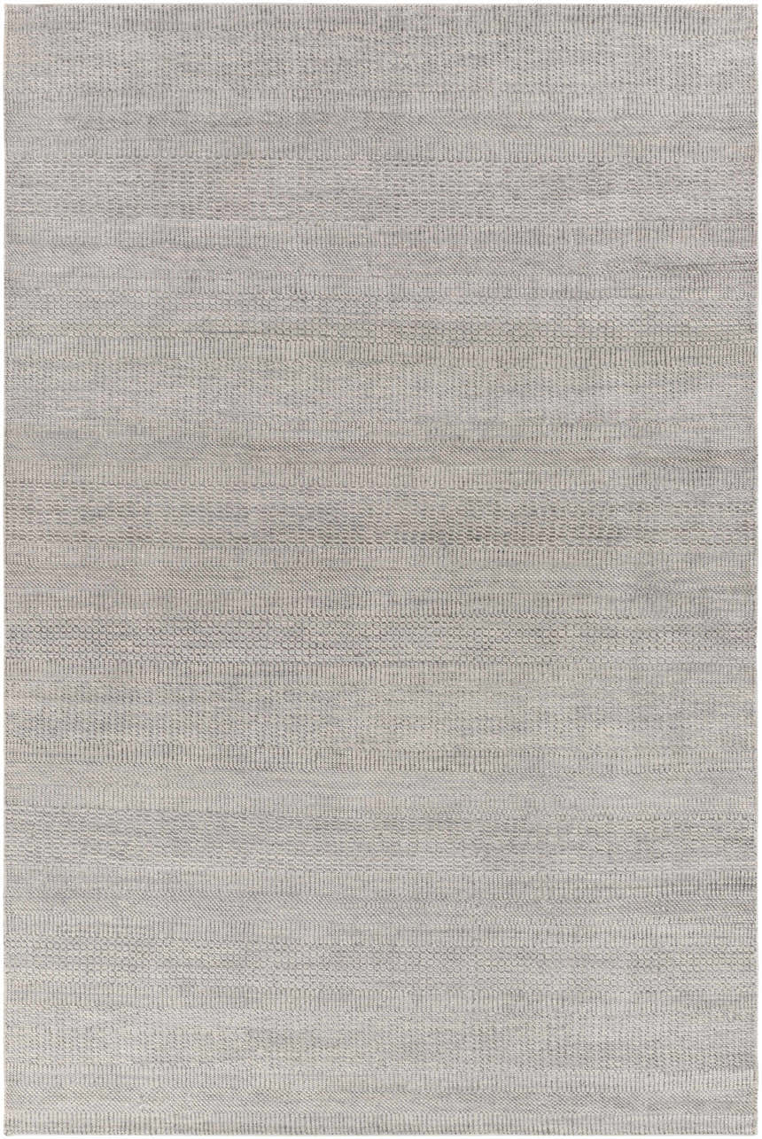 Close-up of the Ocate Gray Wool Area Rug showing its charcoal, gray, and light gray hand-knotted texture. Design-Rectangle-69