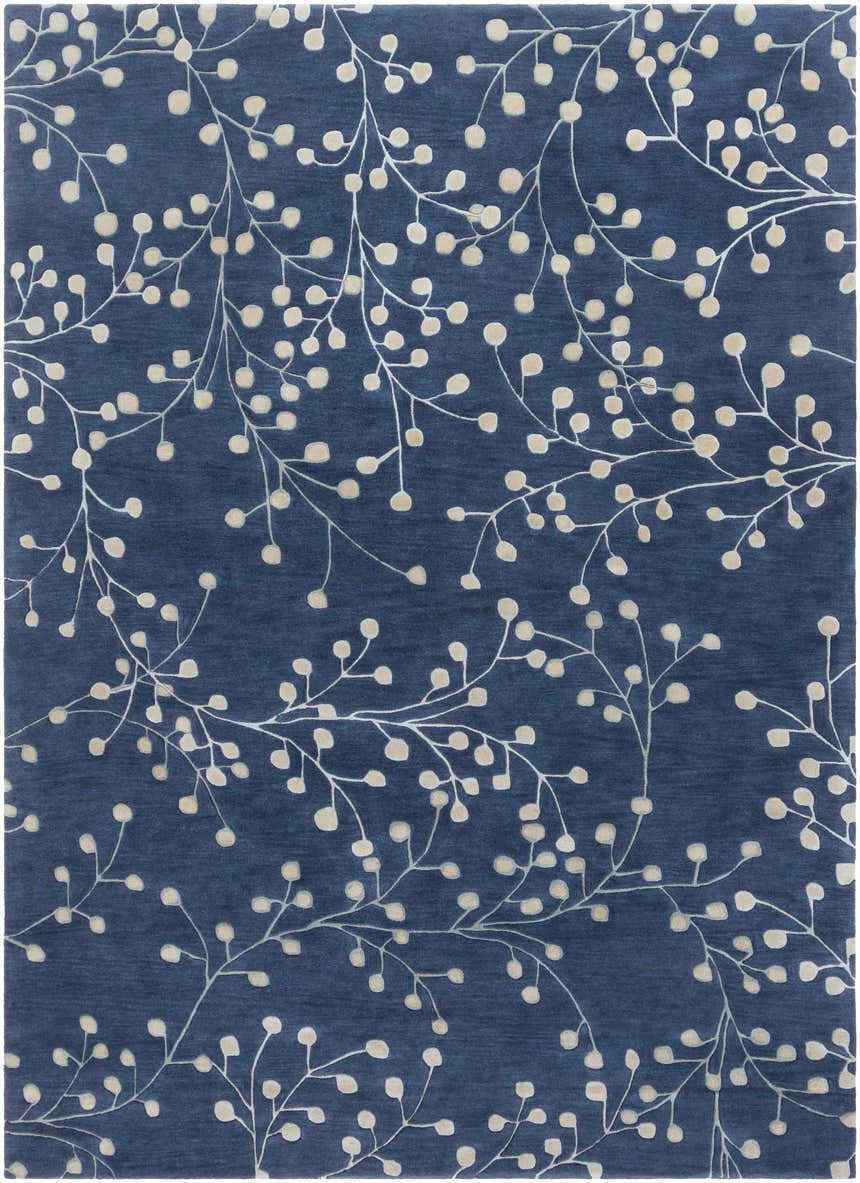 Close-up of the Blue Elsu Area Rug featuring a tan floral pattern on an ink blue wool background. Design-Rectangle-811