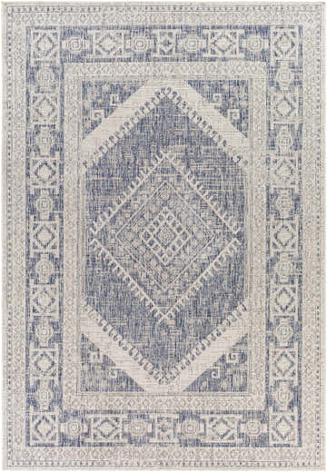 Close-up of the Umraniye Gray Area Rug. Features a geometric, diamond pattern in shades of blue, gray, and off-white. Design-Rectangle-537