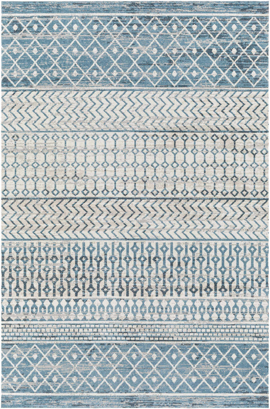 Close-up of the Pinamopoan Washable Area Rug. Features a contemporary blue, gray, and beige geometric pattern. Design-Rectangle-537