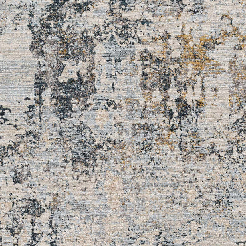 Close-up of the Pinjarra Luxe Rug. Contemporary design in charcoal, cream, and blue hues with a distressed, abstract pattern. Swatch