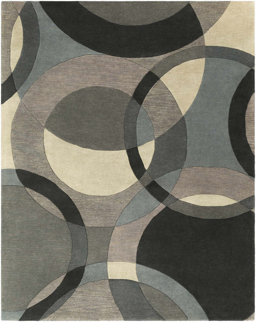Close-up of the Rilton Gray Wool Carpet featuring a contemporary geometric pattern in black, charcoal, gray, taupe, and teal. Design-Rectangle-7696