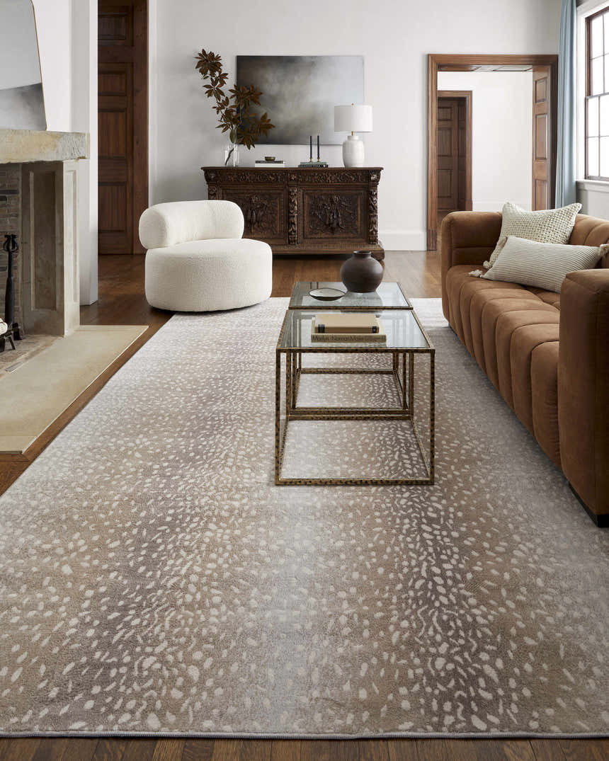 Living room with brown sofa and Pointblank Tan Leopard Print Rug. Neutral tones, modern style. Roomscene-Rectangle
