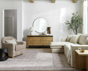 Farmhouse living room with a Livabliss x Our PNW Home Spokane Damask Ivory Rug, beige sofa, and wood accents. Roomscene-Rectangle