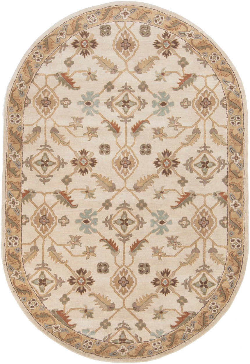 Close-up of oval Postelle Wool Rug. Beige rug with brown, sage, and red floral and geometric pattern. Design-Oval-69