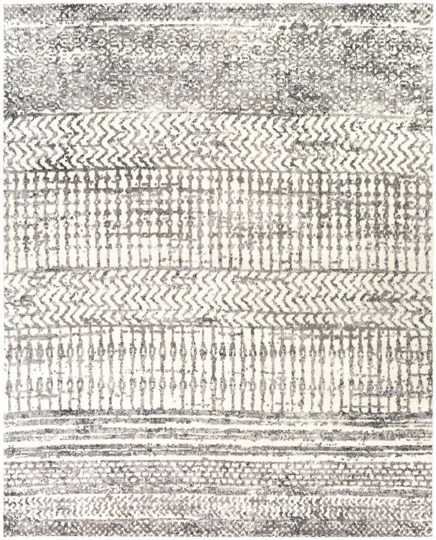 Close-up of the Priston Area Rug. Bohemian style rug in shades of gray, charcoal, and off-white with a geometric pattern. Design-Rectangle-71010