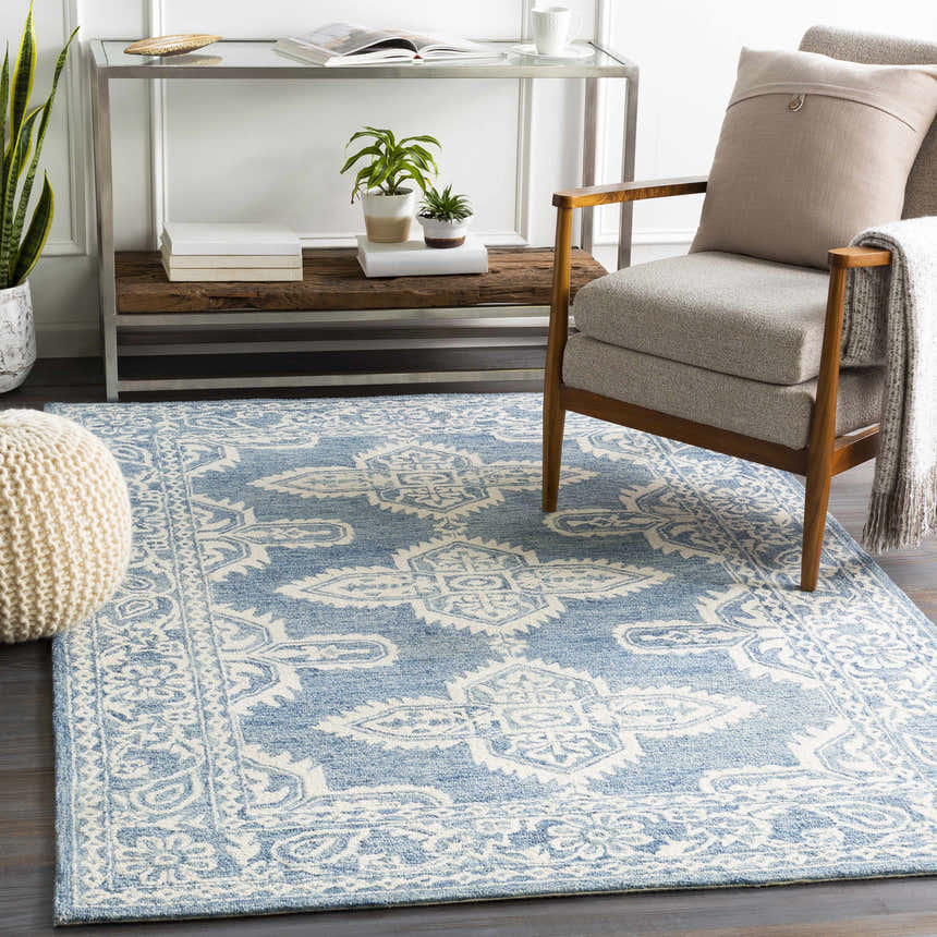 Living room scene with blue and beige Passaic Hand Tufted Wool Rug, chair, and console table. Coastal Grandmother style. Roomscene-Rectangle