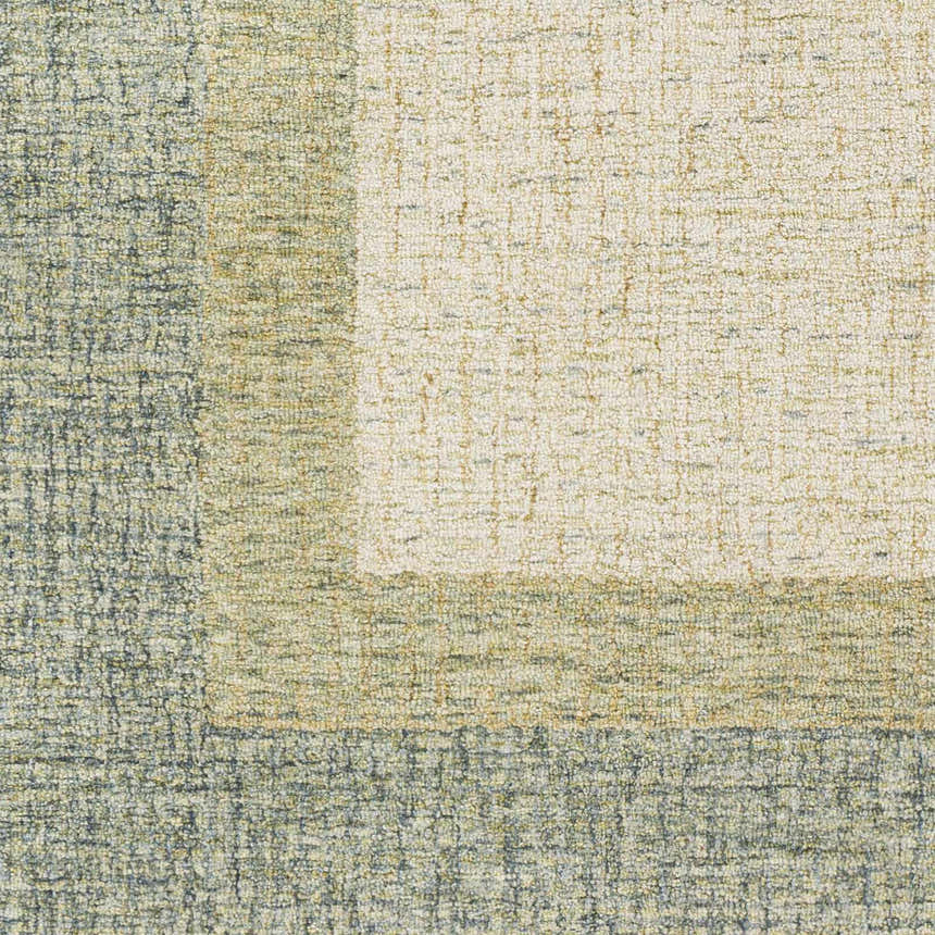Close-up of a hand-tufted Pualas Area Rug. Cream, dusty sage, light beige, and light olive wool rug with a striped pattern. Swatch