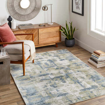 Living room scene with blue and sage Pyle Area Rug, wood furniture, and modern decor. Roomscene-Rectangle
