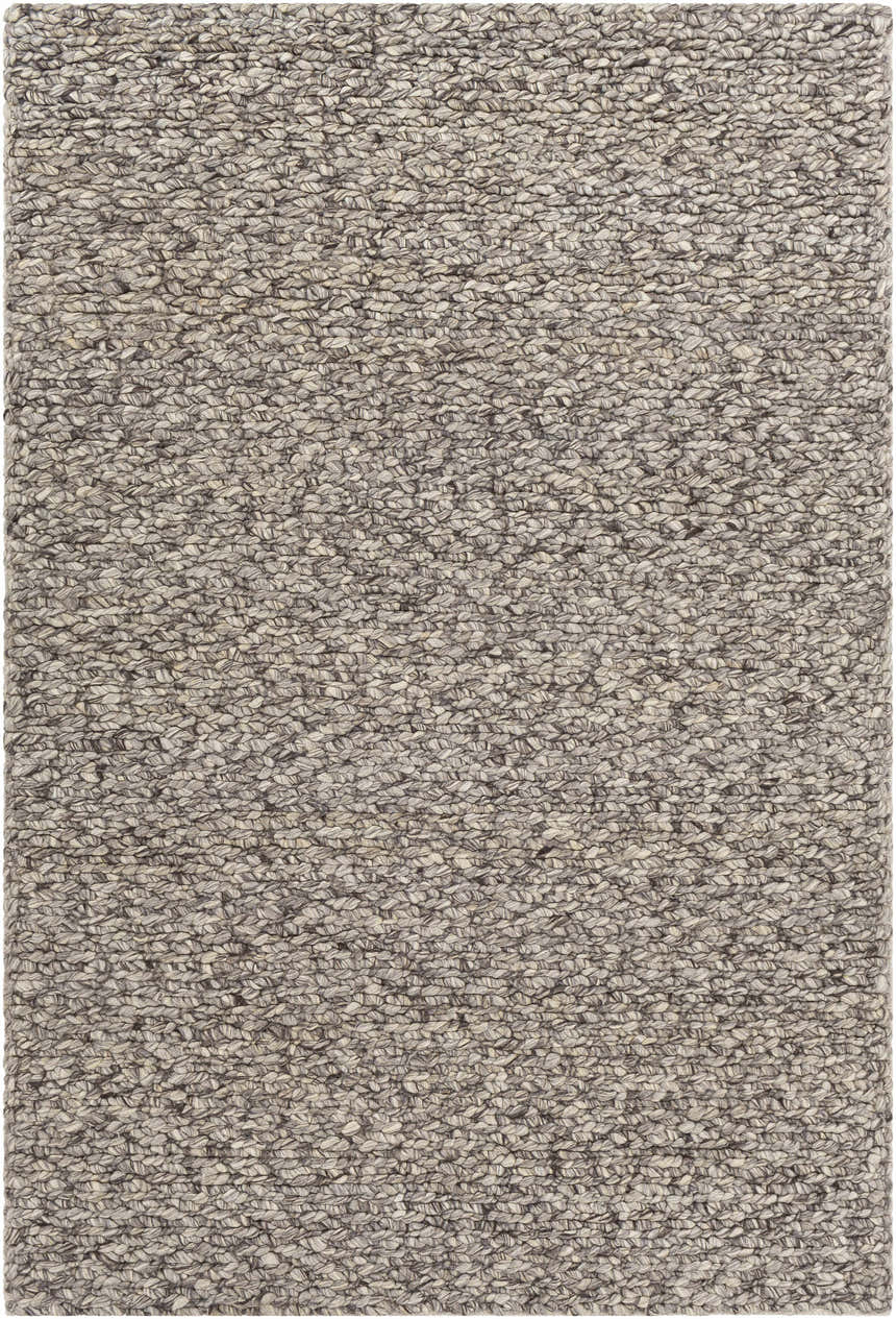 Close-up of the hand woven Rockfield Clearance Rug. Black and cream wool rug with a textured, farmhouse design. Design-Rectangle-576