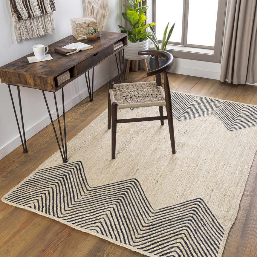 Bohemian home office with Light Beige Ringtead Jute Braided Carpet, wood desk, woven chair, and potted plants. Roomscene-Rectangle