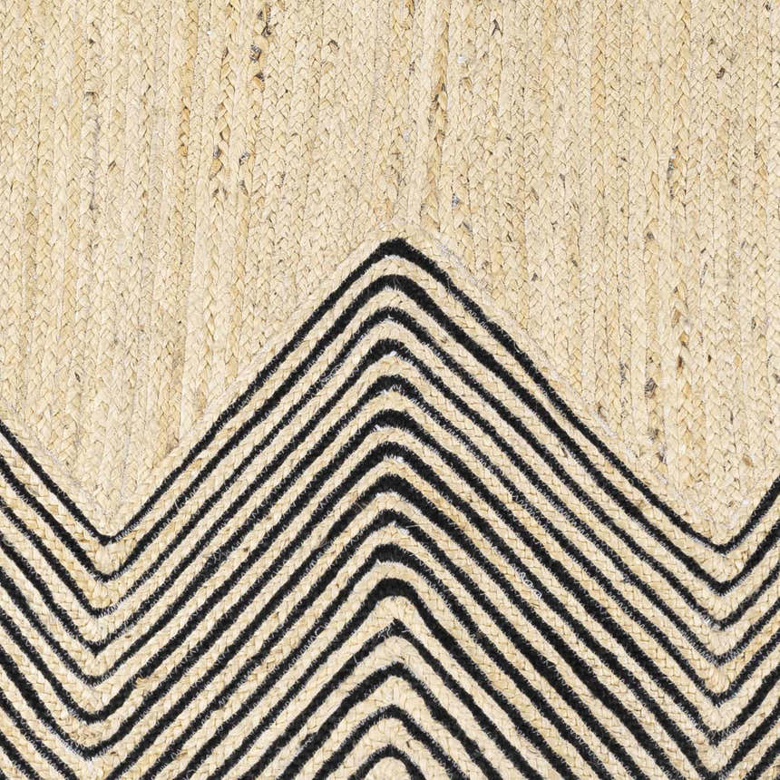 Close-up of the Light Beige Ringtead Jute Braided Carpet showing the braided texture and black chevron pattern. Swatch