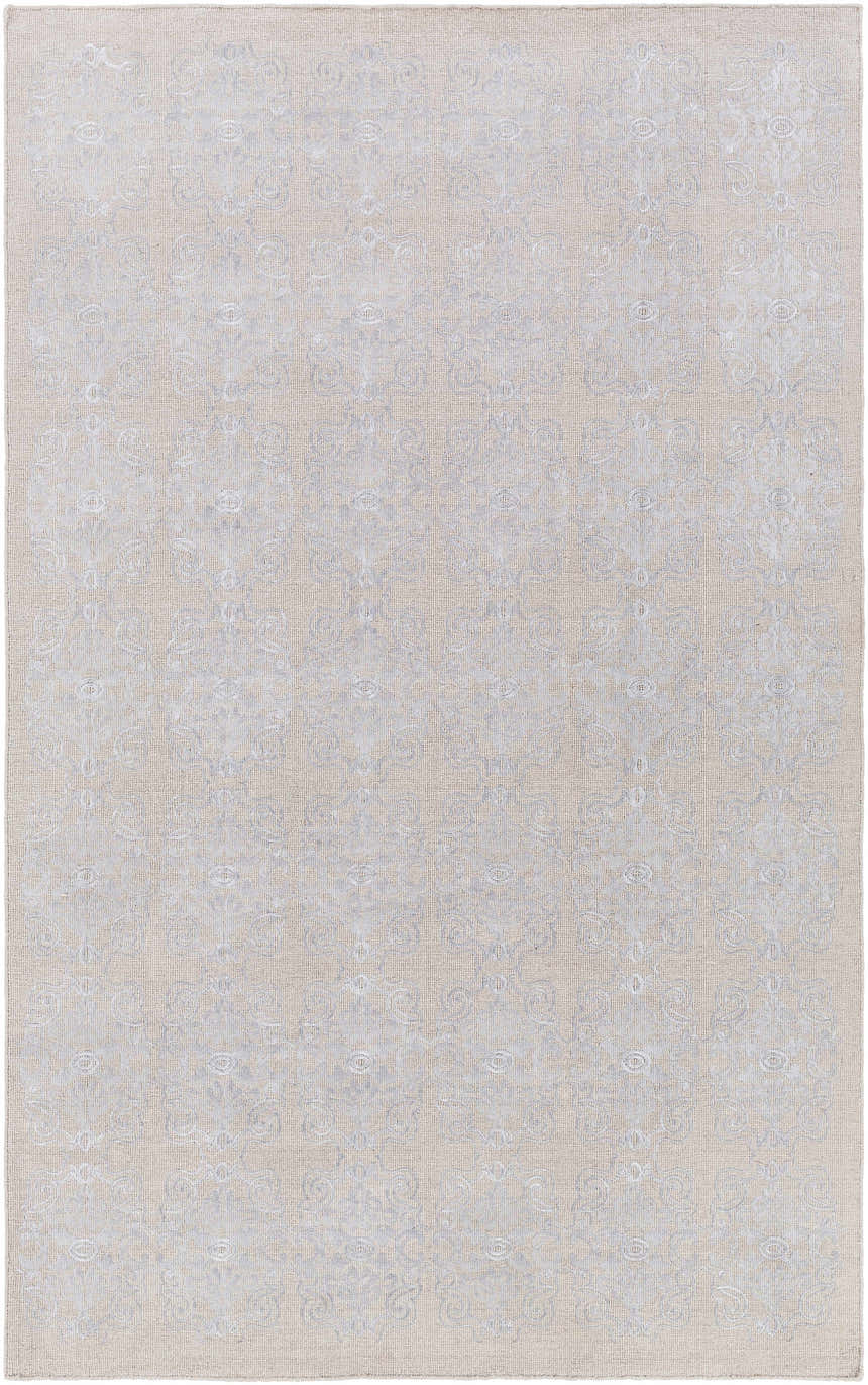 Close-up of the Ronceverte Area Rug showing a subtle, light blue floral pattern on a beige, hand-woven wool texture. Design-Rectangle-527