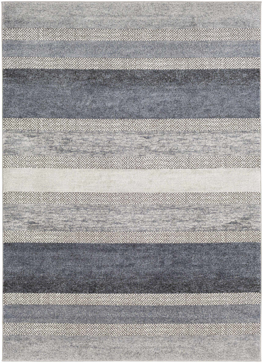Close-up of Ravendale Area Rug. Modern striped design in cream, gray, and slate. Machine-woven polypropylene rug. Design-Rectangle-5373