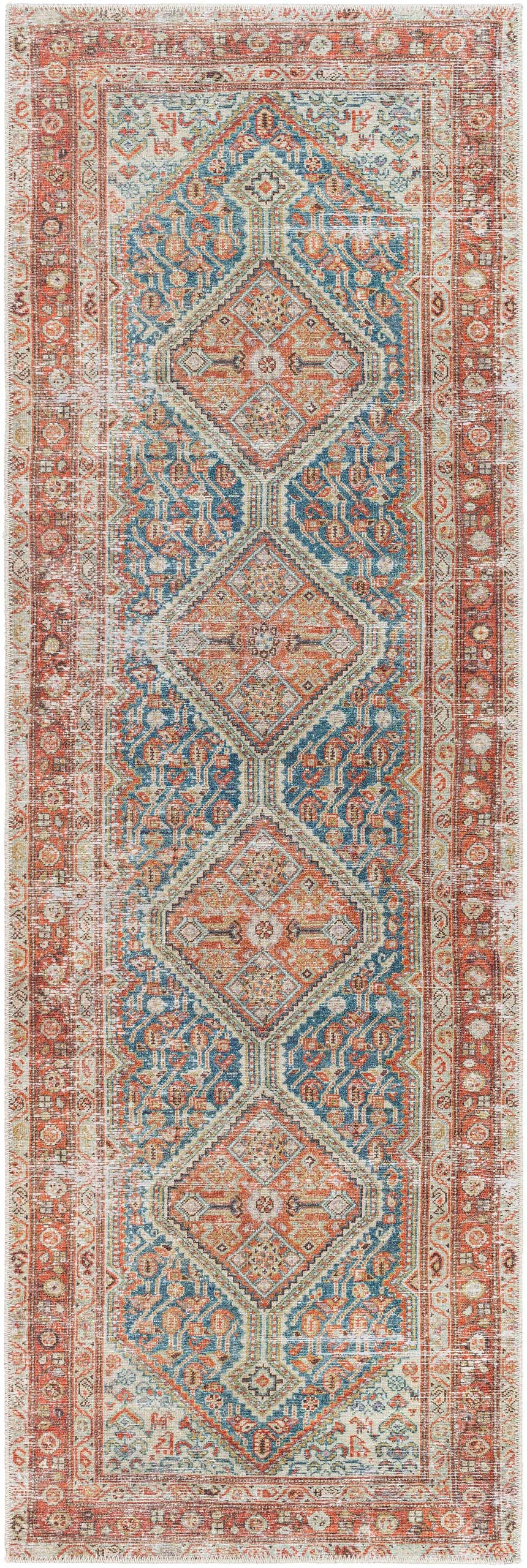 Close-up of the Rio Washable Area Rug. Runner rug with farmhouse style, traditional pattern in orange, blue, and cream. Design-Runner-27710