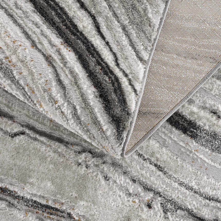 Close-up of the Live Marble Dark Gray Area Rug showing its charcoal, gray, and off-white marble-like pattern and woven texture. Fold