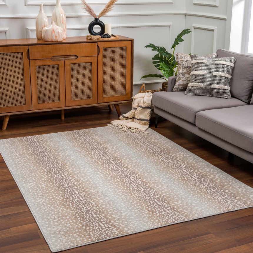 Living room scene with a Pointblank Tan Leopard Print Rug, gray sofa, and mid-century modern wood cabinet. Roomscene-Rectangle