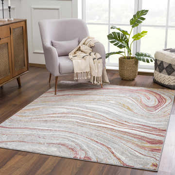Living room scene with a Live Marble Pink Area Rug, gray chair, wood cabinet, and monstera plant. Roomscene-Rectangle