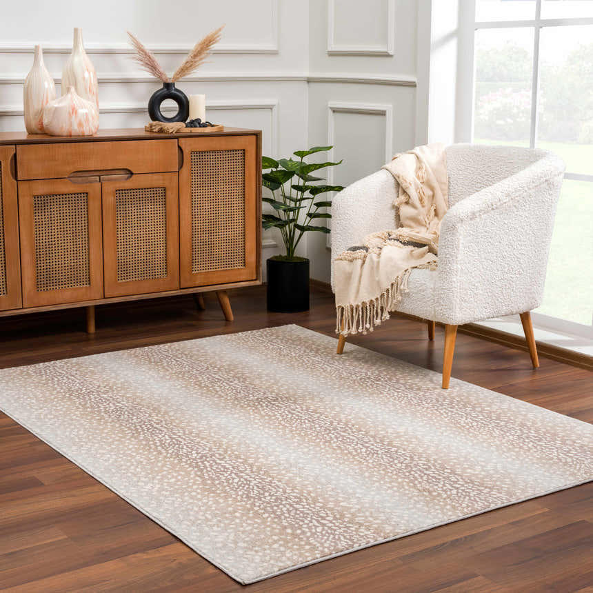 Living room scene with a Pointblank Tan Leopard Print Rug, wood cabinet, and ivory chair. Roomscene-Rectangle
