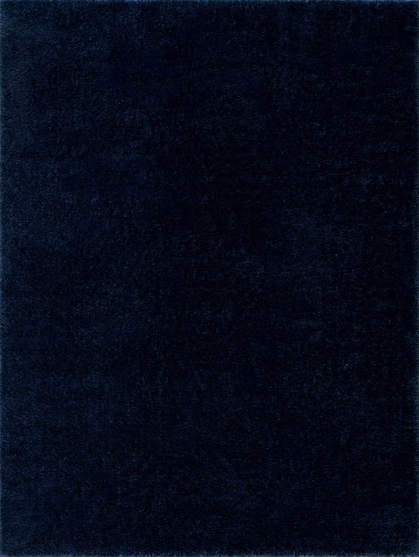 Close-up of the Navero Dark Blue rug, showcasing its subtle wavy texture and minimalist design in deep navy polyester. Design-Rectangle-58