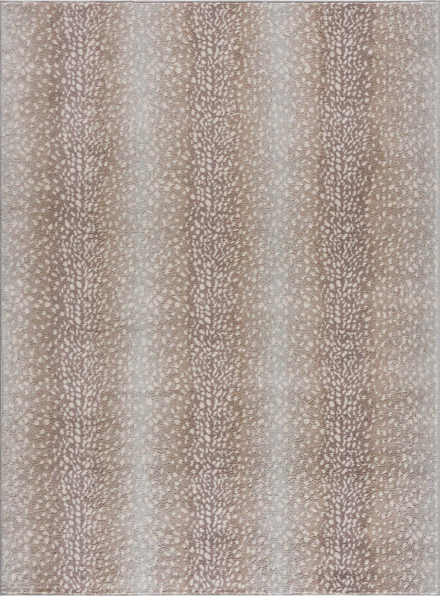 Close-up of Pointblank Tan Leopard Print Rug. Animal print rug in tan, ivory, gray, and light slate. Design-Rectangle
