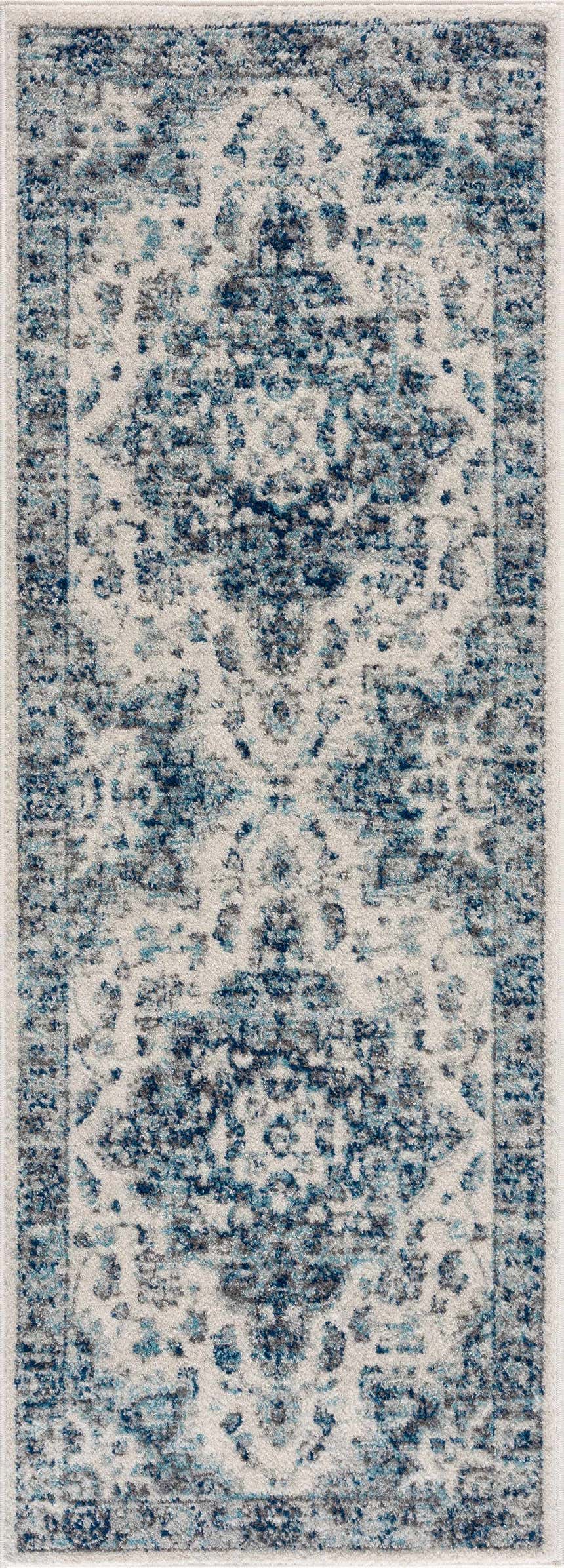 Close-up of the Istanbullu Blue Area Rug, featuring an ivory and silver gray traditional pattern. Design-Runner-38