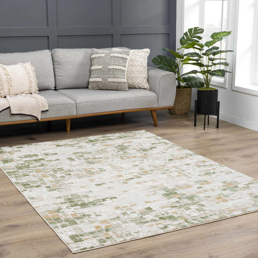 Living room with gray sofa and the Liveri Green Mosaic Rug, an abstract design in green and beige tones. Roomscene-Rectangle