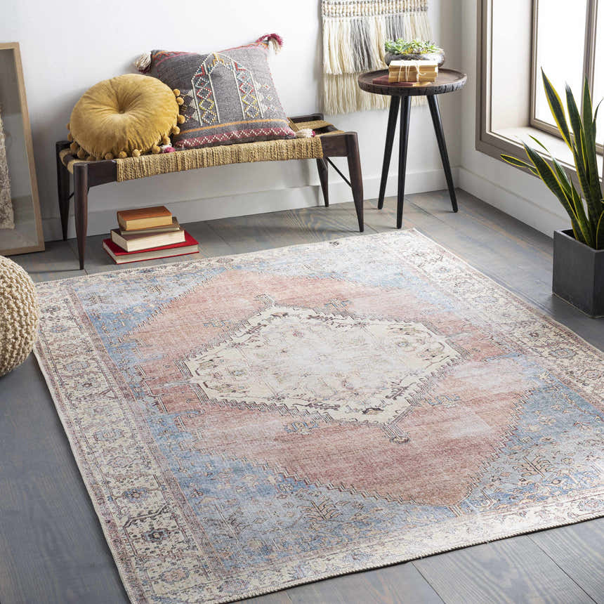 Bohemian living room with Sacriston Washable Area Rug in aqua, blue, rose, and tan colors. Roomscene-Rectangle