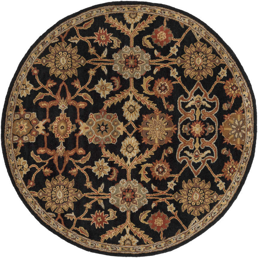 Close-up of round Salix Hand Tufted Black Wool Rug with brick red, camel, and mustard floral pattern. Design-Round