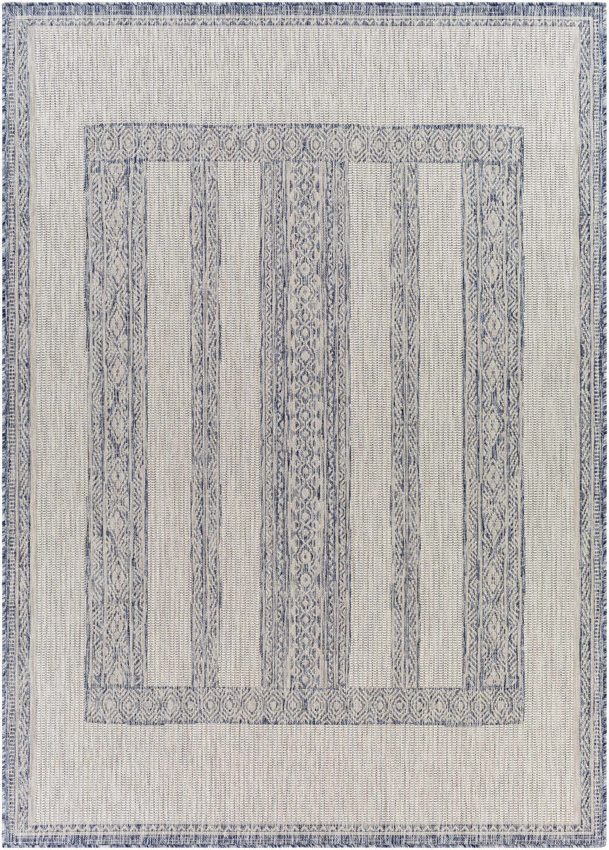 Close-up of the Sallynoggin Indoor & Outdoor Rug. Features a geometric pattern in shades of off-white and blue. Design-Rectangle-537