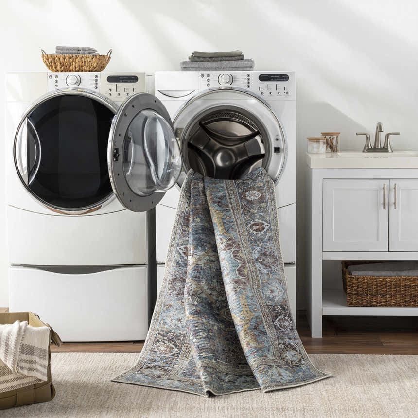 Kaif Washable Area Rug in a laundry room, being washed in a front load washing machine. Easy clean rug. Washing-Machine