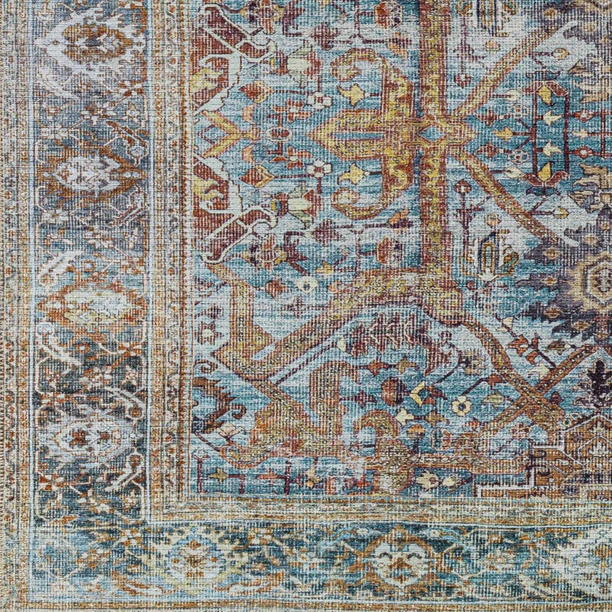 Close-up of the Kaif Washable Area Rug. Traditional design with teal, brown, and gold tones. Machine woven texture. Swatch