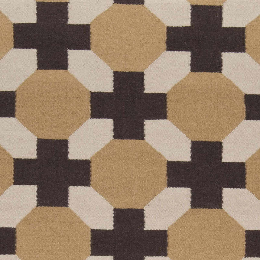 Close-up of the Satartia Area Rug. Dark brown cross and mustard octagon pattern on light gray wool. Hand woven texture. Swatch