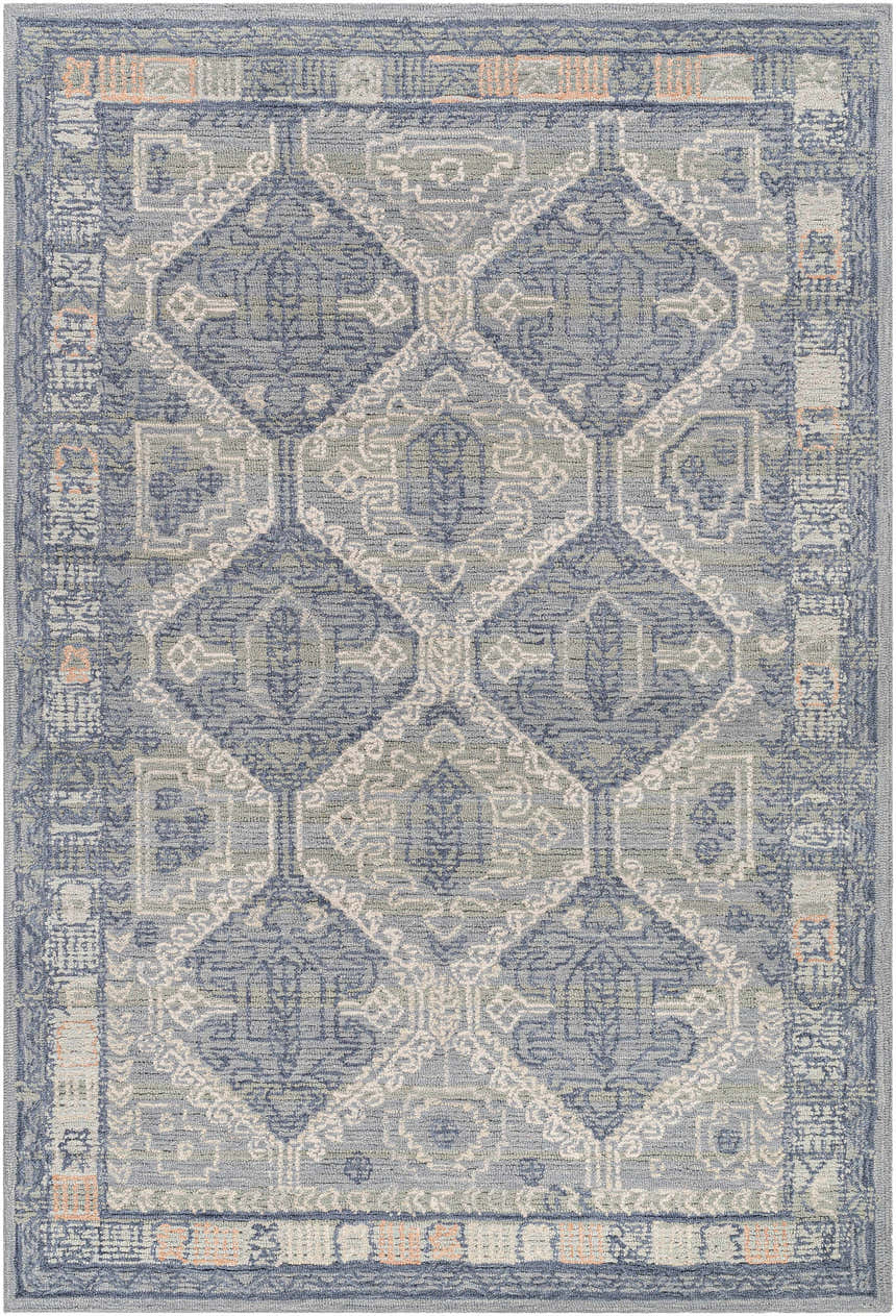 Detailed view of the Doman Area Rug - Clearance with a traditional diamond pattern in dark and light grays and subtle peach accents. Design-Rectangle-576