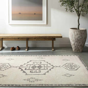 Entryway with Solona Medallion Beige Rug, wood bench, desert art, potted olive tree, and neutral tones. Livabliss x Becki Owens. Roomscene-Rectangle