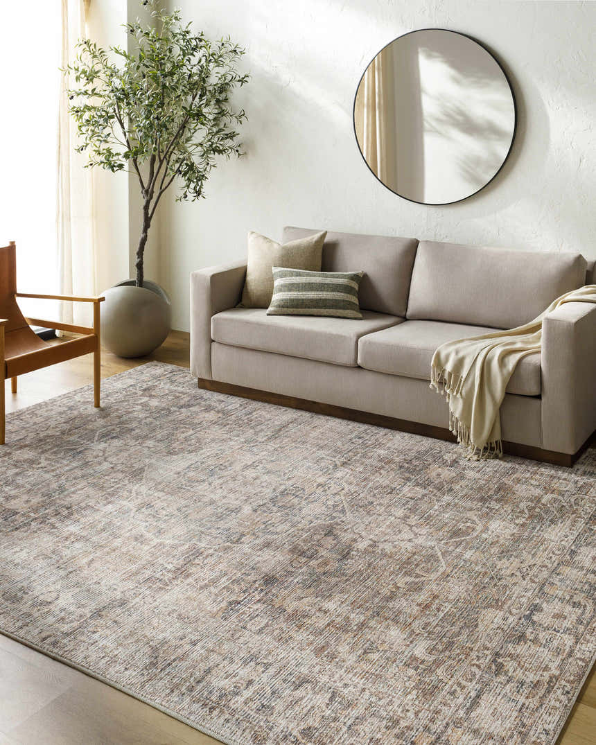 Living room scene with tan sofa and Marlene Medallion Brown Area Rug by Becki Owens x Livabliss. Farmhouse style. Roomscene-Rectangle