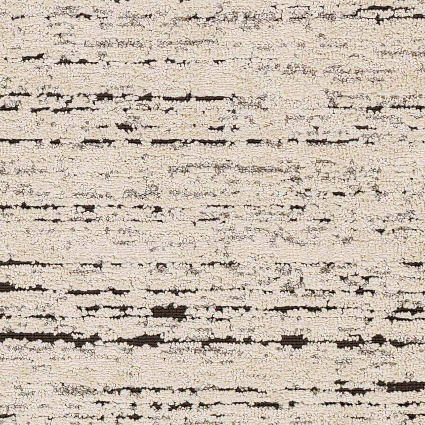 Close-up of Elian Area Rug showing bone and dark brown horizontal stripes and textured, machine-woven construction. Swatch