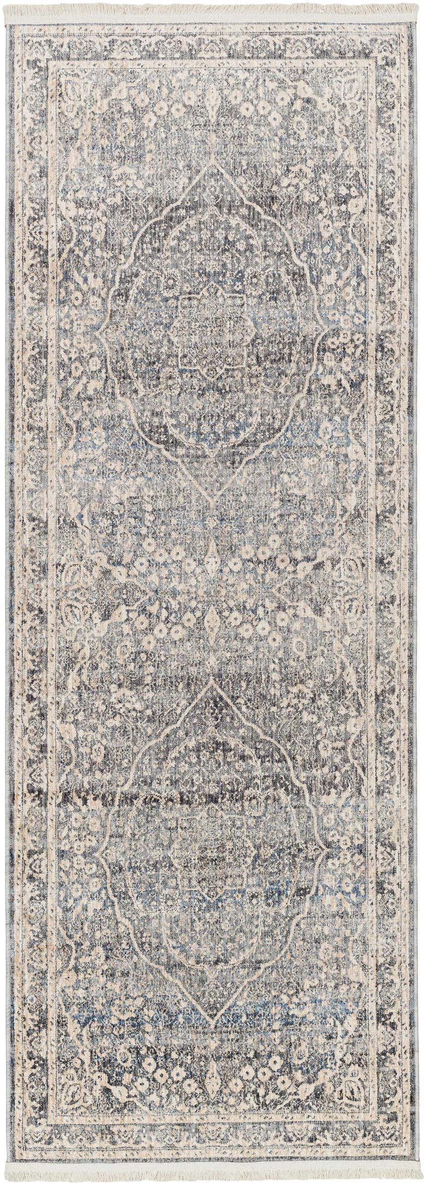 Close-up of the Anouk Area Rug. Dark gray, light gray, and blue traditional rug with a distressed look. Design-Runner-2108