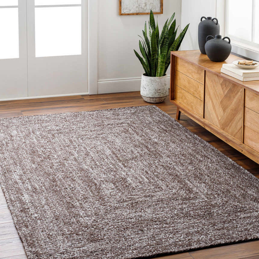 Living room scene with a gray Kenyi Area Rug, wood floors, and a mid-century modern cabinet. Roomscene-Rectangle