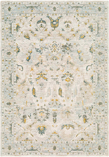 Close-up of the Emile Textured Rug. Traditional floral pattern in dusty sage, light gray, mustard, and off-white hues. Design-Rectangle-575
