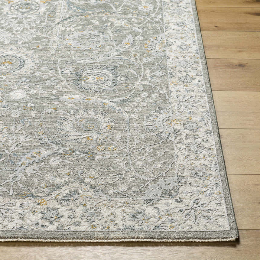 Close-up of the Gauge Gray Blue Textured Rug showing its farmhouse style pattern and soft, neutral colors. Front