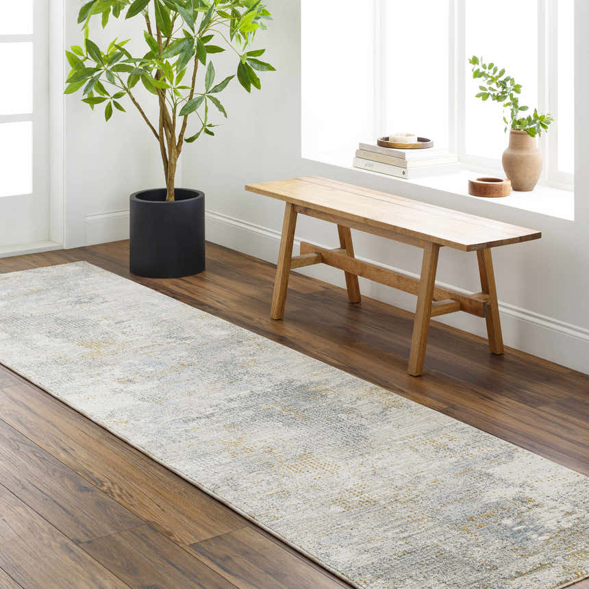 Entryway with Gryta Textured Rug runner, wood floors, bench, potted plant, and natural light. Roomscene-Runner