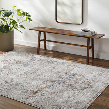 Entryway scene with a Lecea Gray Area Rug, wood bench, mirror, and potted plant. Roomscene-Rectangle