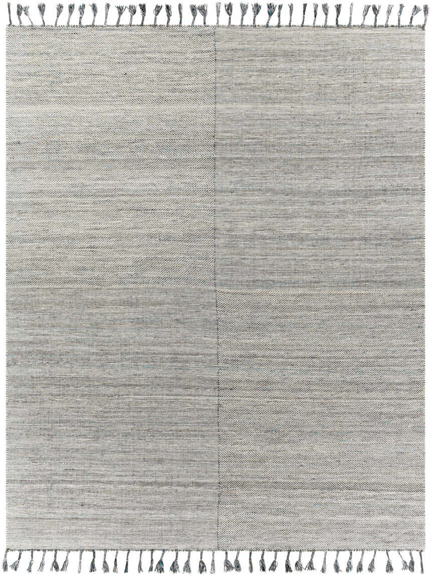 Close-up of the hand-woven Anaya Beige & Teal Area Rug. Features a subtle pattern, textured weave, and decorative tassels. Design-Rectangle-810