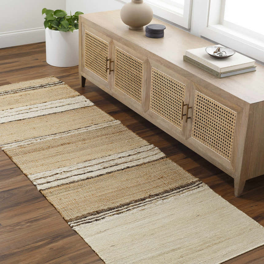 Entryway scene with a beige Arnie Area Rug runner in front of a light wood console table. Roomscene-Runner