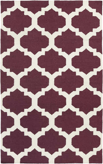 Close-up of the Shotton Area Carpet, a hand-woven wool rug with a dark purple and ivory geometric pattern. Design-Rectangle-58