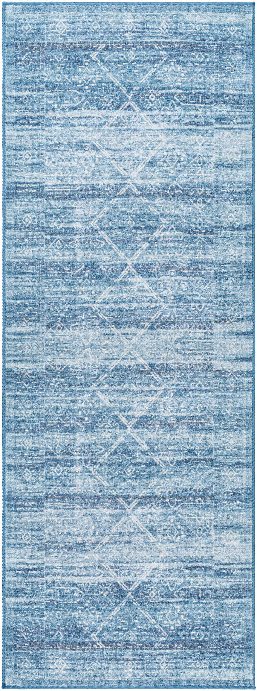 Close-up of the Blake Arctic Sky Washable Area Rug. Features a traditional geometric pattern in shades of blue, gray and white. Design-Runner-2773