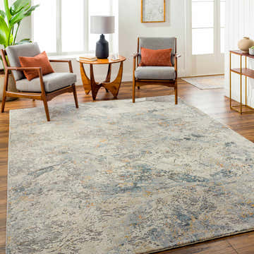 Living room scene with Amzie Area Rug in cloud gray, dark gray, and nutmeg colors, styled with mid-century modern furniture. Roomscene-Rectangle