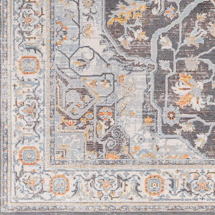 Close-up of the Hayfa Area Rug, showcasing its traditional gray, light gray, and orange floral pattern and machine-woven texture. Swatch